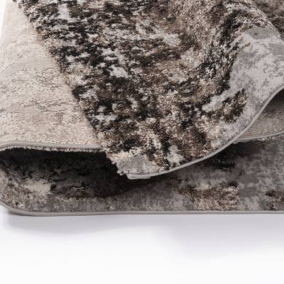 Detailaufnahme Designteppich in braun und beige von heineking24